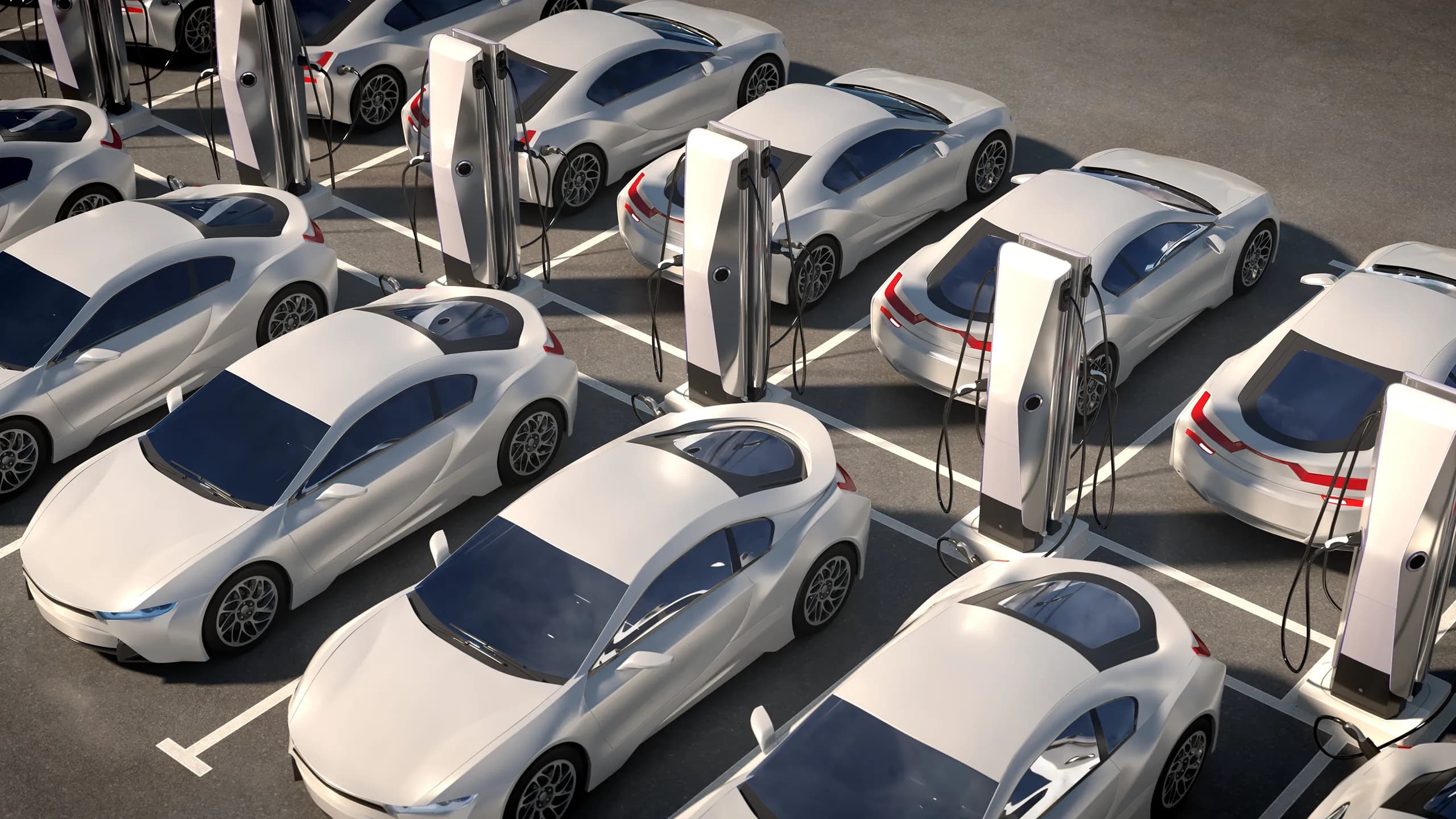 Parking lot of electric cars with charging stations.